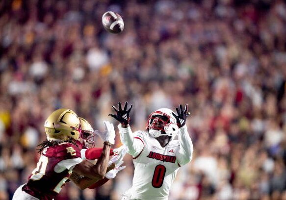 CHESTNUT HILL, MASSACHUSETTS - OCTOBER 25: Chris Bell #0 of the Louisville Cardinals misses a pass during the first quarter of a game against the Boston College Eagles at Alumni Stadium on October 25, 2024 in Chestnut Hill, Massachusetts. (Photo by Maddie Malhotra/Getty Images)