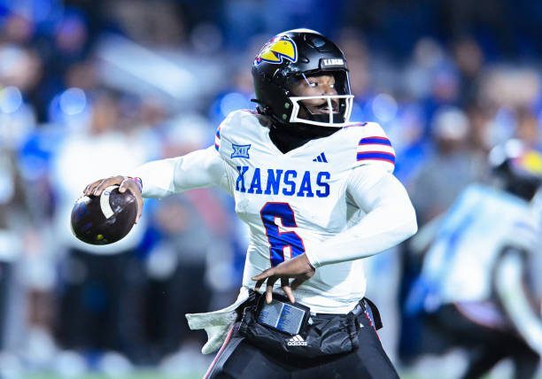 gettyimages-2184670031-612x612 PROVO, UT - NOVEMBER 16: Kansas Jayhawks quarterback Jalon Daniels (6) during a game between the Kanas Jayhawks and the BYU Cougars during a college football game on November 16, 2024 at Lavell Edwards Stadium in Provo, Utah. (Photo by Boyd Ivey/Icon Sportswire via Getty Images)