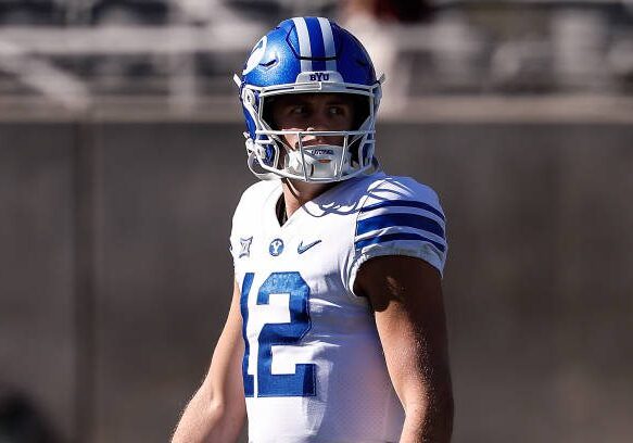 TEMPE, AZ - NOVEMBER 23:  Brigham Young Cougars quarterback Jake Retzlaff (12) looks on before the college football game between the BYU Cougars and the Arizona State Sun Devils on November 23, 2024 at Mountain America Stadium in Tempe, Arizona. (Photo by Kevin Abele/Icon Sportswire via Getty Images)