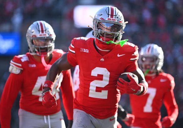 gettyimages-2187065010-612x612 COLUMBUS, OHIO - NOVEMBER 30: Caleb Downs #2 of the Ohio State Buckeyes reacts after intercepting the ball during the third quarter of a game against the Michigan Wolverines at Ohio Stadium on November 30, 2024 in Columbus, Ohio. (Photo by Ben Jackson/Getty Images)