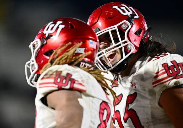 gettyimages-2187526565-612x612 ORLANDO, FLORIDA - NOVEMBER 29: Spencer Fano #55 of the Utah Utes reacts after a touchdown by Landen King #82 in the second half of a game against the UCF Knights at FBC Mortgage Stadium on November 29, 2024 in Orlando, Florida. (Photo by Julio Aguilar/Getty Images)