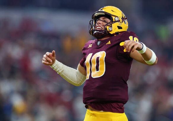 ARLINGTON, TEXAS - DECEMBER 7: Sam Leavitt #10 of the Arizona State Sun Devils celebrates during the second half of the Big 12 Championship game against the Iowa State Cyclones at AT&amp;T Stadium on December 7, 2024 in Arlington, Texas. (Photo by Aaron M. Sprecher/Getty Images)