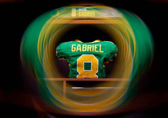 PASADENA, CALIFORNIA - JANUARY 1: Dillon Gabriel's #8 of the Oregon Ducks jersey sits in the locker room before the game against the Ohio State Buckeyes at Rose Bowl Stadium on January 1, 2025 in Pasadena, California. (Photo by CFP/Getty Images)