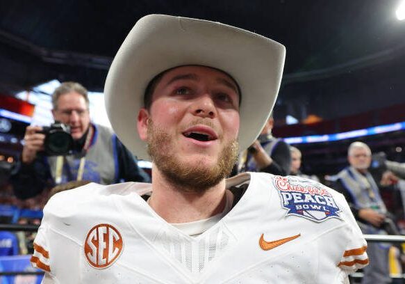 ATLANTA, GEORGIA - JANUARY 01: Quinn Ewers #3 of the Texas Longhorns celebrates after defeating the Arizona State Sun Devils 39-31 during the second overtime in the Chick-fil-A Peach Bowl at Mercedes-Benz Stadium on January 01, 2025 in Atlanta, Georgia.  (Photo by Kevin C. Cox/Getty Images)