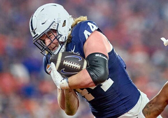 GLENDALE, ARIZONA - DECEMBER 31: Penn State Nittany Lions tight end Tyler Warren (44) battles with Boise State Broncos safety Ty Benefield (0) to catch the football and scores a touchdown in action during the 2024 Vrbo Fiesta Bowl between the Penn State Nittany Lions and Boise State Broncos at State Farm Stadium on December 31, 2024 in Glendale, Arizona. (Photo by Robin Alam/ISI Photos/Getty Images)