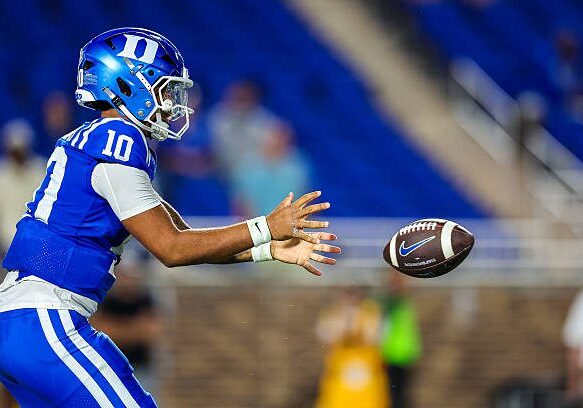 DURHAM, NORTH CAROLINA - AUGUST 28: Darian Mensah #10 of the Duke Blue Devils snaps the ball during the second half of a football game against the Elon Phoenix at Wallace Wade Stadium on August 28, 2025 in Durham, North Carolina. (Photo by David Jensen/Getty Images)