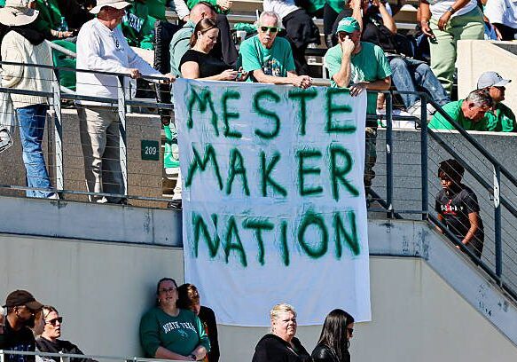 DENTON, TX - NOVEMBER 01: A sign cheerling on North Texas Mean Green quarterback Drew Mestemaker (17) hangs from the upper deck during the game between the North Texas Mean Green and the Navy Midshipmen on November 1, 2025 at DATCU Stadium in Denton, Texas. (Photo by Matthew Pearce/Icon Sportswire via Getty Images)
