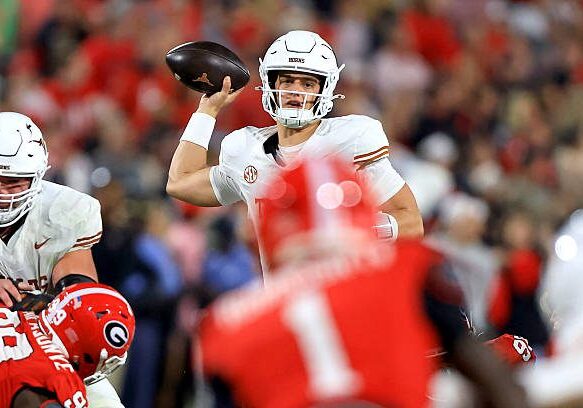 ATHENS, GA - NOVEMBER 15: Quarterback Arch Manning (16) of the Texas Longhorns looks for a receiver during the Saturday evening college football game between the Georgia Bulldogs and the Texas Longhorns on November 15, 2025 at Sanford Stadium in Athens, GA.  (Photo by David J. Griffin/Icon Sportswire via Getty Images)