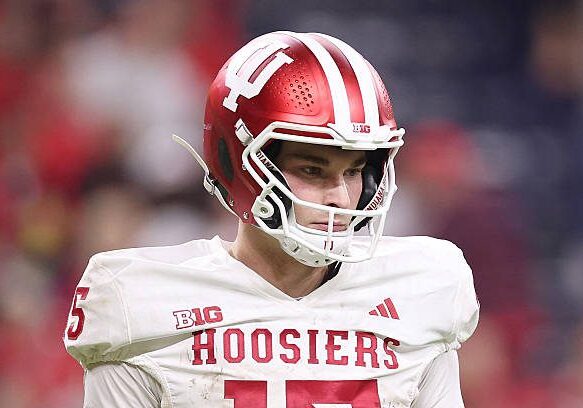 INDIANAPOLIS, INDIANA - DECEMBER 06: Fernando Mendoza #15 of the Indiana Hoosiers looks on against the Ohio State Buckeyes in the 2025 Big Ten Football Championship at Lucas Oil Stadium on December 06, 2025 in Indianapolis, Indiana.  (Photo by Michael Reaves/Getty Images)