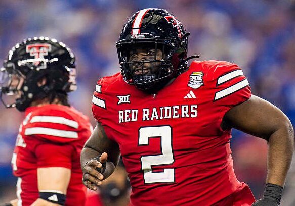 ARLINGTON, TEXAS - DECEMBER 06: Lee Hunter #2 of the Texas Tech Red Raiders runs across the field during the first half the Big 12 Championship game against the BYU Cougars at AT&amp;T Stadium on December 06, 2025 in Arlington, Texas.  (Photo by John E. Moore III/Getty Images)