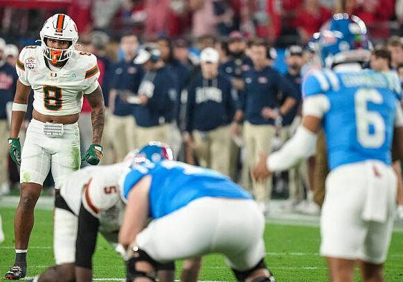GLENDALE, ARIZONA - JANUARY 8: Jakobe Thomas #8 of the Miami Hurricanes watches against Trinidad Chambliss #6 of the Ole Miss Rebels during the second half of CFP Semifinal Vrbo Fiesta Bowl at State Farm Stadium on January 8, 2026 in Glendale, Arizona. (Photo by CFP/Getty Images)