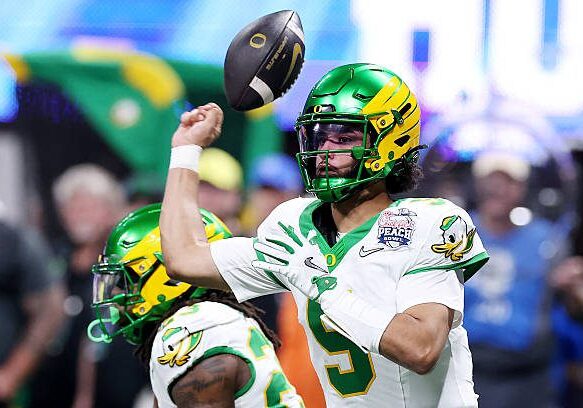 ATLANTA, GEORGIA - JANUARY 09: Dante Moore #5 of the Oregon Ducks loses the ball against the Indiana Hoosiers during the second quarter in the 2025 College Football Playoff Semifinal at the Chick-fil-A Peach Bowl at Mercedes-Benz Stadium on January 09, 2026 in Atlanta, Georgia. (Photo by Kevin C. Cox/Getty Images)