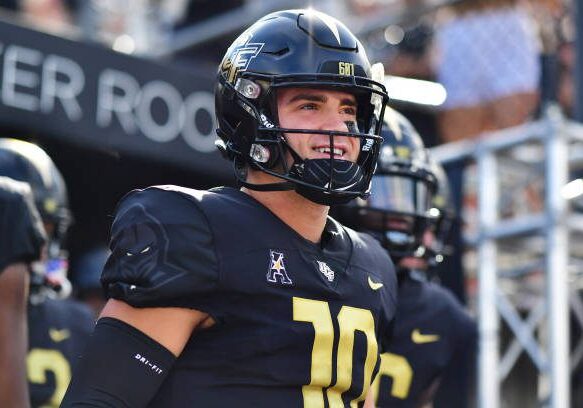 ORLANDO, FLORIDA - OCTOBER 29: John Rhys Plumlee #10 of the UCF Knights looks on prior to a game against the Cincinnati Bearcats at FBC Mortgage Stadium on October 29, 2022 in Orlando, Florida. (Photo by Julio Aguilar/Getty Images)